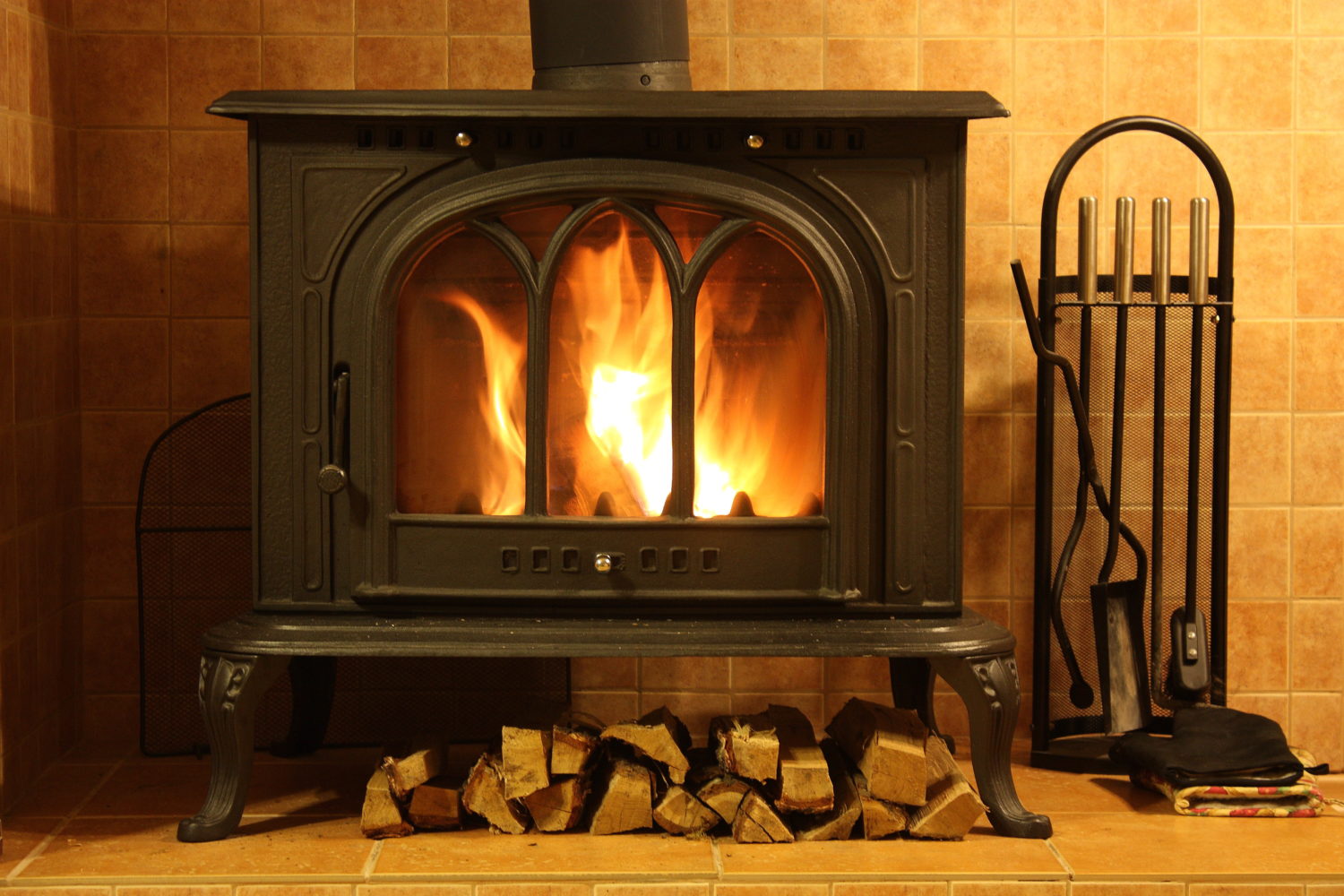 Fire burning in the cozy fireplace | Wade Insurance Agency